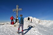 52 Foto di vetta alla croce di Cima Grem (2049 m) con da sfondo l'Arera